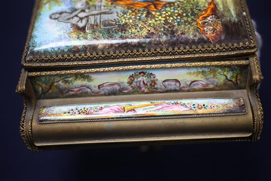 Two 20th century Viennese enamel musical boxes, in the form of a piano and a cello with stand, 6.5in. & 11.5in.